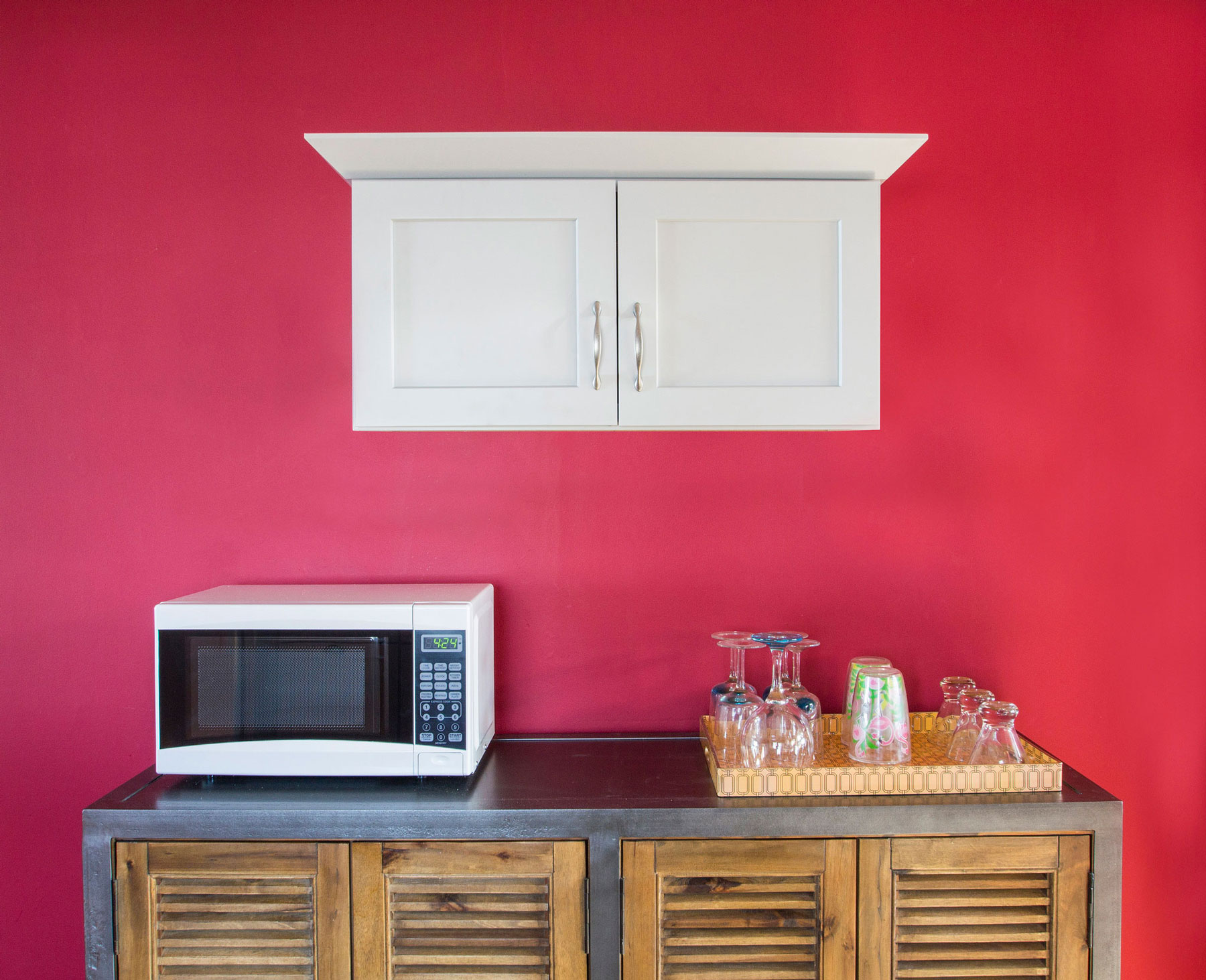 Kitchen remodel - light grey cabinet above dry bar
